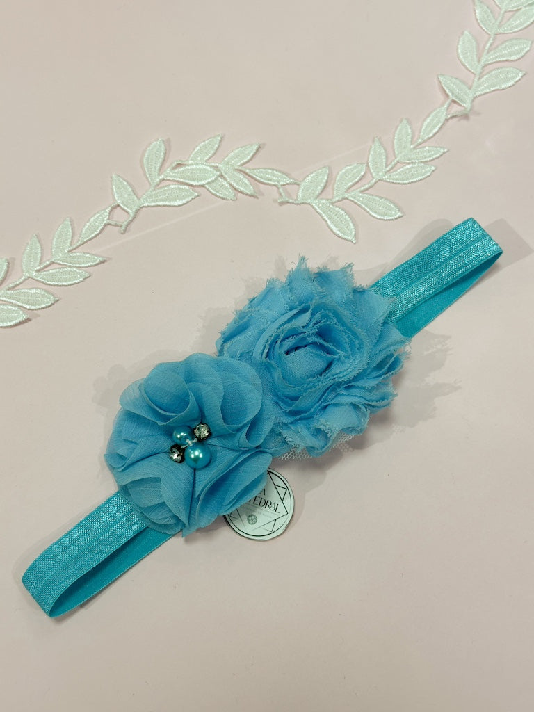 Liga de novia celeste con flores