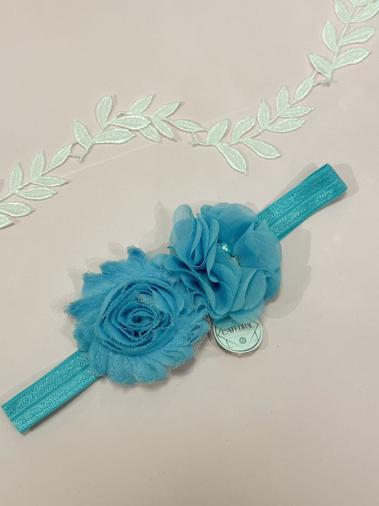Liga de novia celeste con flores