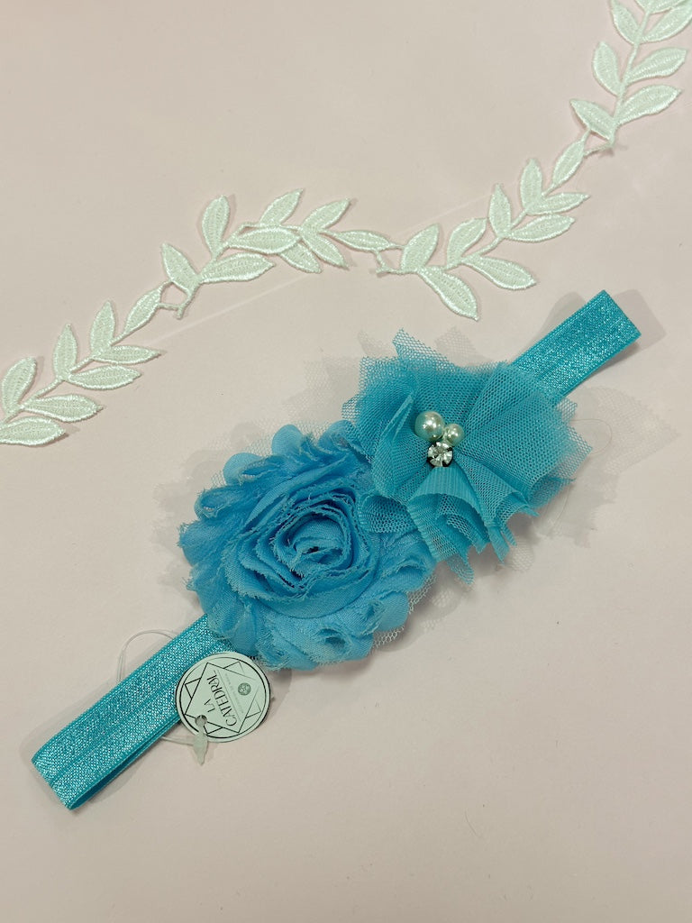 Liga de novia celeste con flores